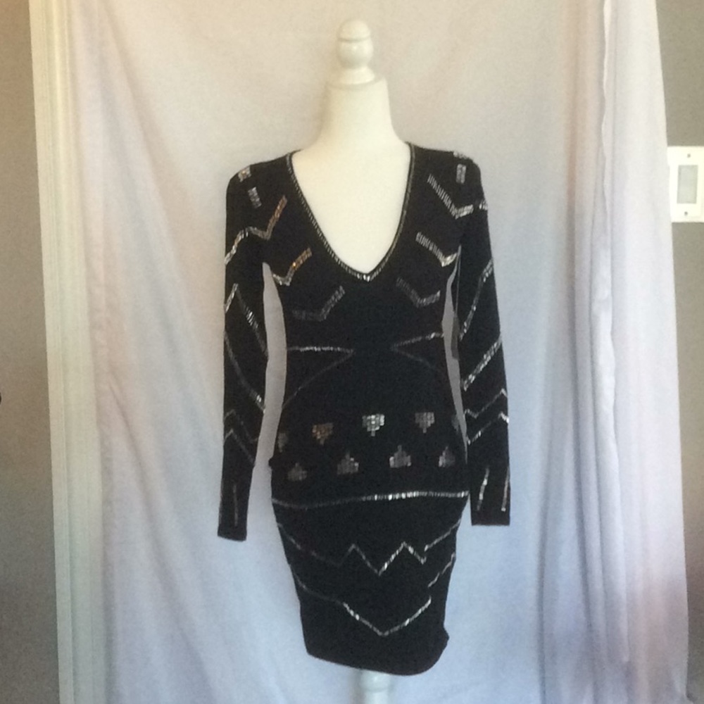 Black metallic knit dress with silver bugle beads